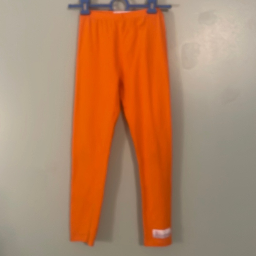 Little girls, orange pants by Flowersak